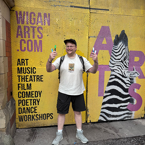 Wigan Poet 'The Chubby Northerner' Spreads Positivity with ‘Pavement Poetry’ Project 